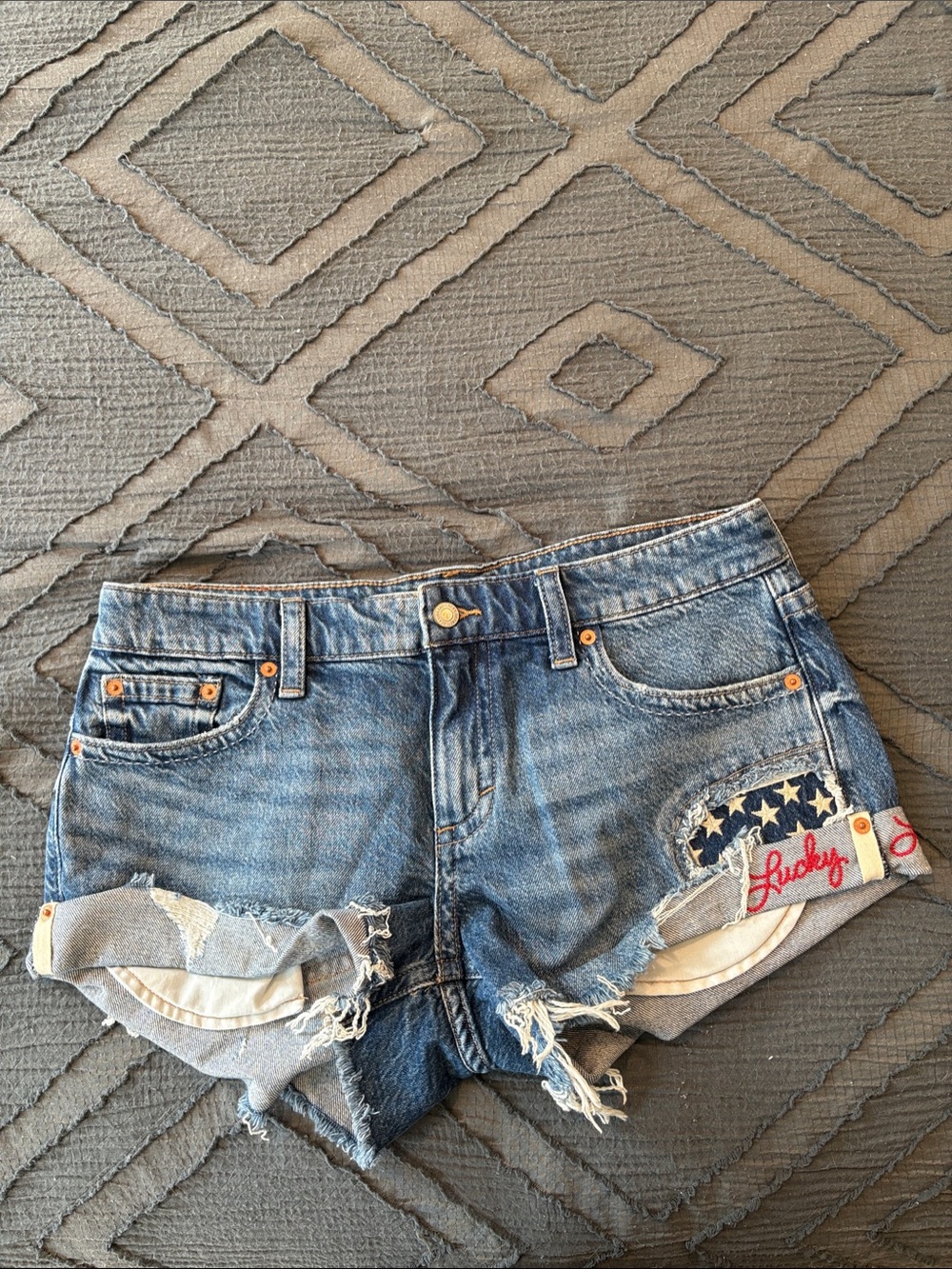 Lucky Brand Blue Distressed Denim Shorts with Flag Patch